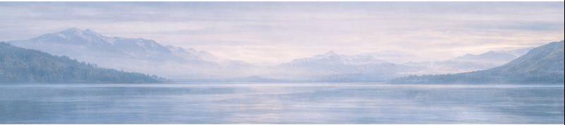 Misty lake and mountains